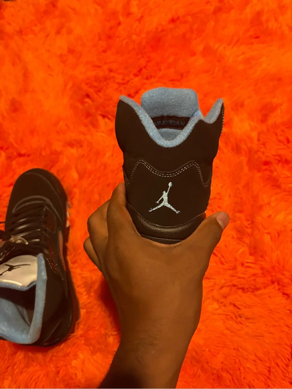 Jordan Black and Light Blue High-Top Sneakers